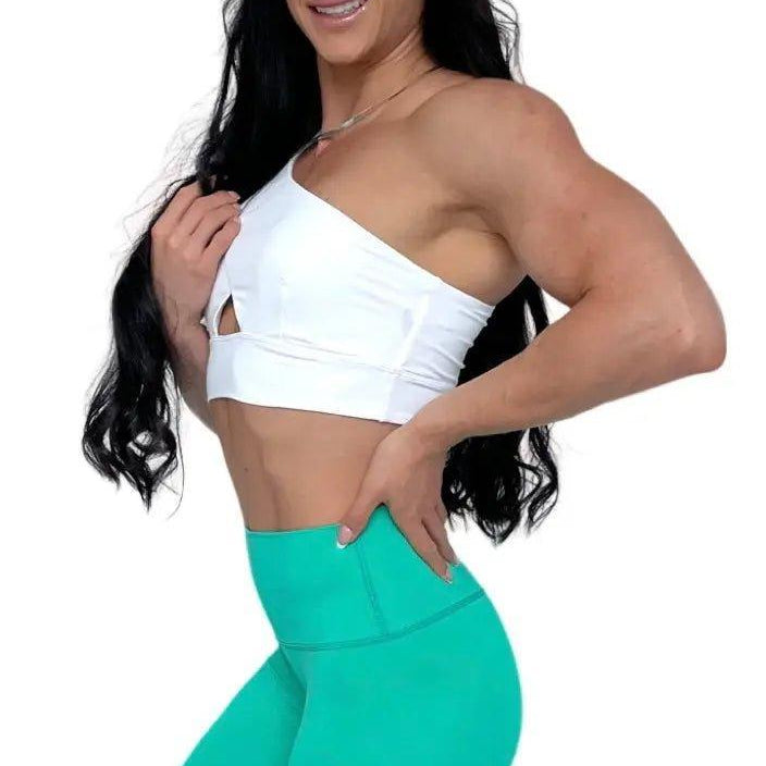 Mujer vistiendo los leggings compresivos de cintura alta Legging Myself de LUXFEEL en color Verde Menta, que ofrecen un efecto segunda piel.