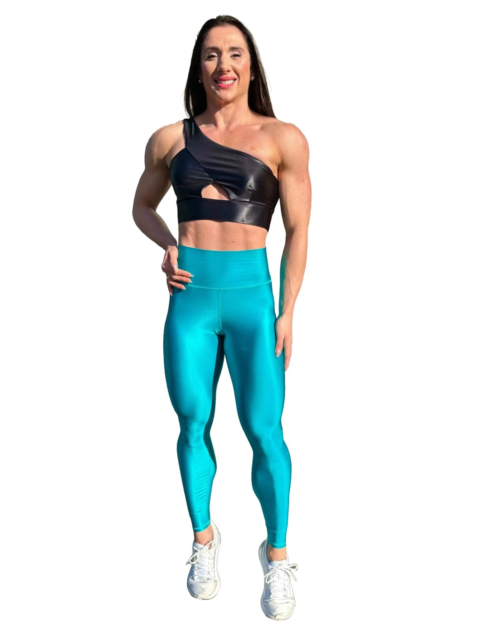 Mujer vistiendo los leggings brillantes de cintura alta Legging Pearl Shine de LUXFEEL en color Azul Capri Brillante, con acabado efecto perla.