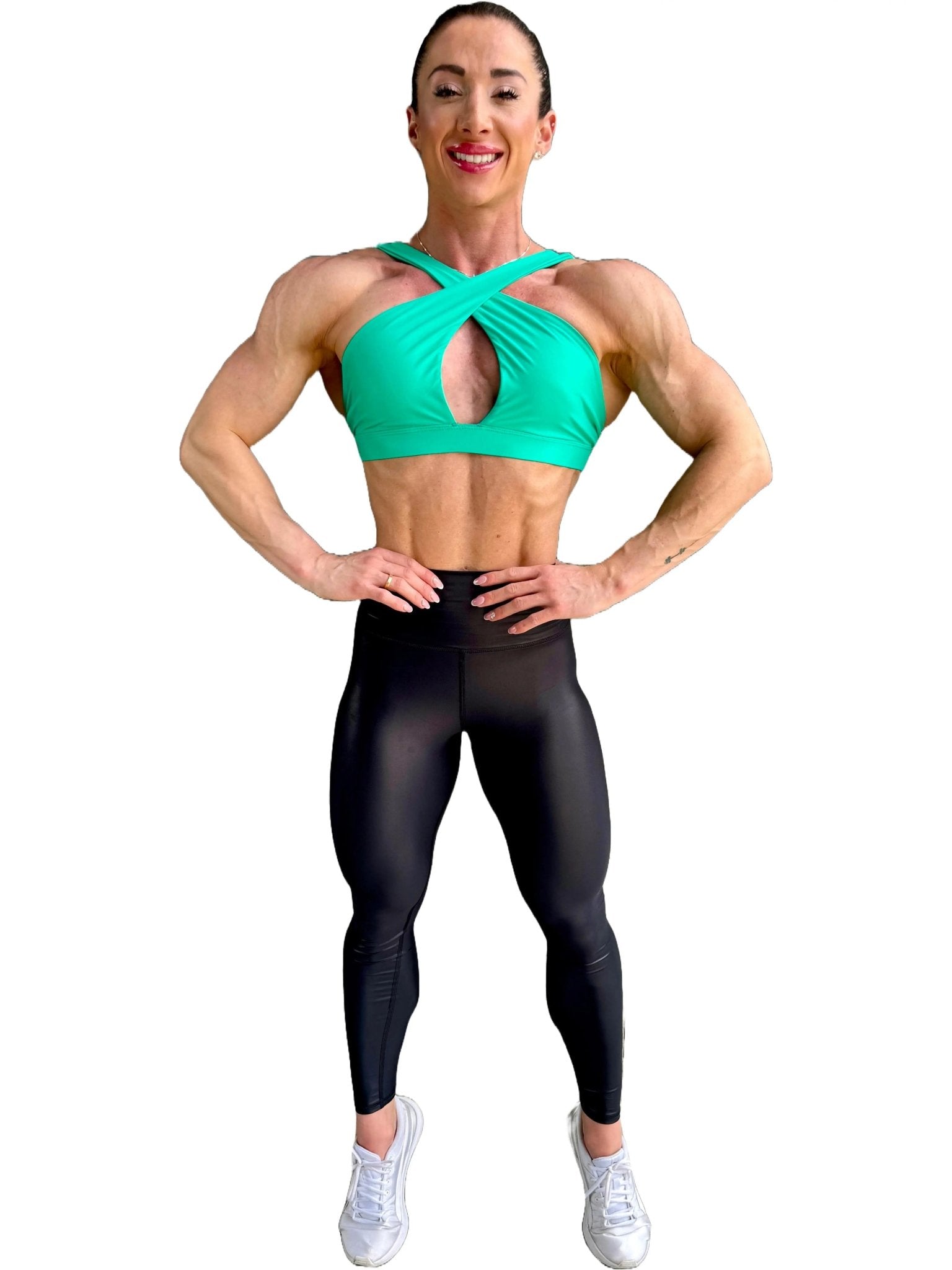 Mujer vistiendo los leggings brillantes de cintura alta Legging Pearl Shine de LUXFEEL en color Negro Brillante, con acabado efecto perla.