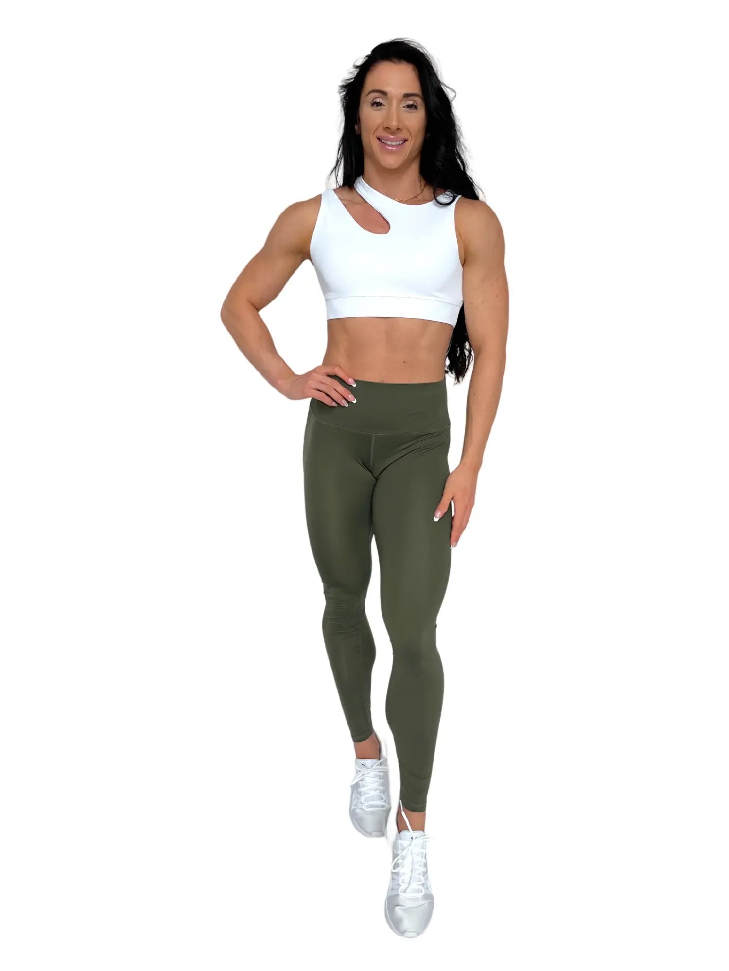 Mujer vistiendo los leggings compresivos de cintura alta Legging Myself de LUXFEEL en color  Verde Caqui / Verde Kaki, que ofrecen un efecto segunda piel.