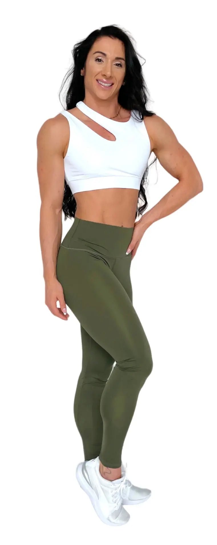 Mujer vistiendo los leggings compresivos de cintura alta Legging Myself de LUXFEEL en color  Verde Caqui / Verde Kaki, que ofrecen un efecto segunda piel.