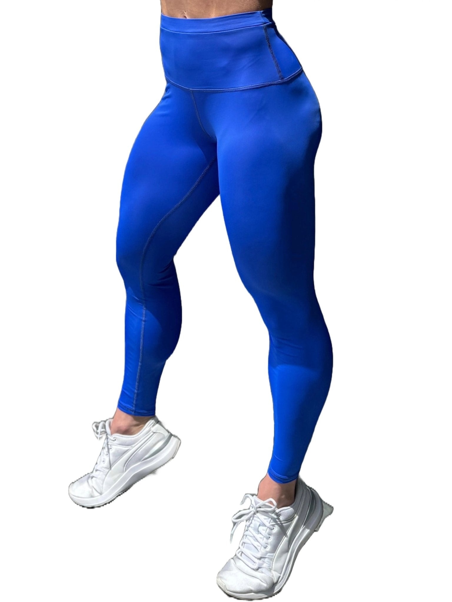 Mujer vistiendo los leggings compresivos de cintura alta Legging Myself de LUXFEEL en color Azul, que ofrecen un efecto segunda piel.